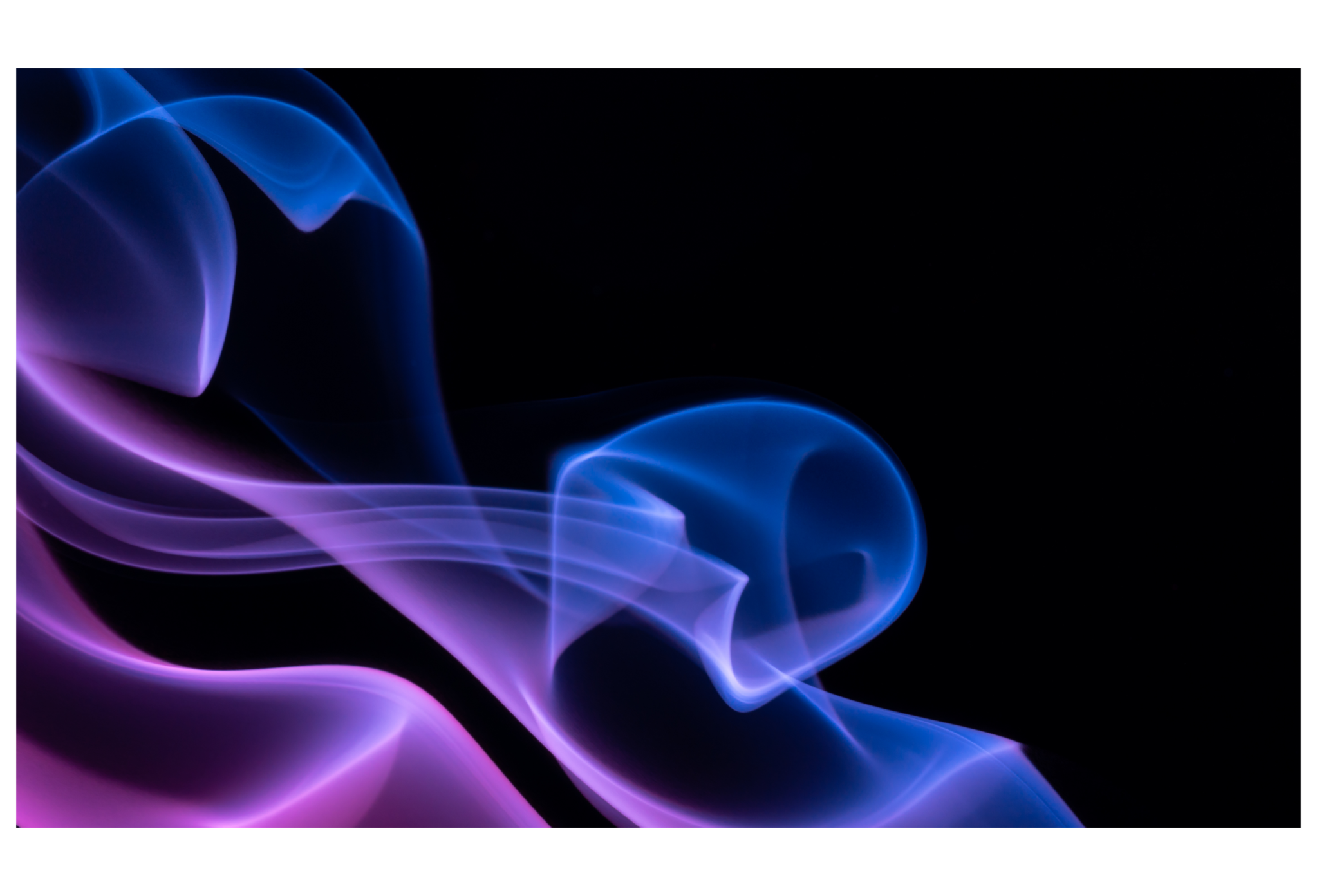 dark background with blue and pink smoke