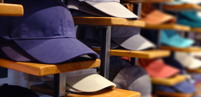 Shelves with baseball hats
