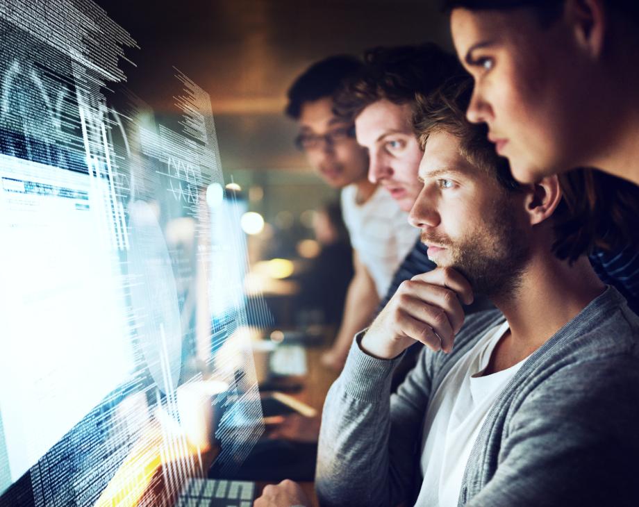 developers around a monitor