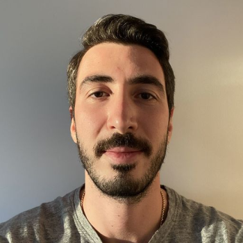 Color headshot of Taylan Oztekin, digital strategist at software company Acquia