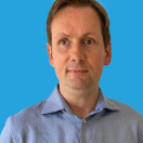 Lars Holm Sørensen Headshot on Light Blue Background