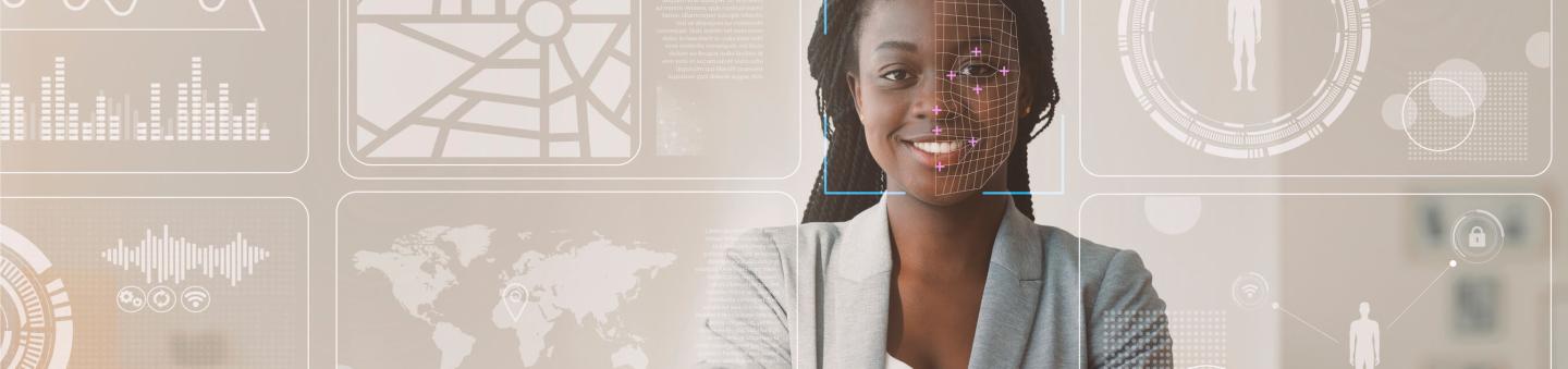 African American businesswoman with info on virtual display